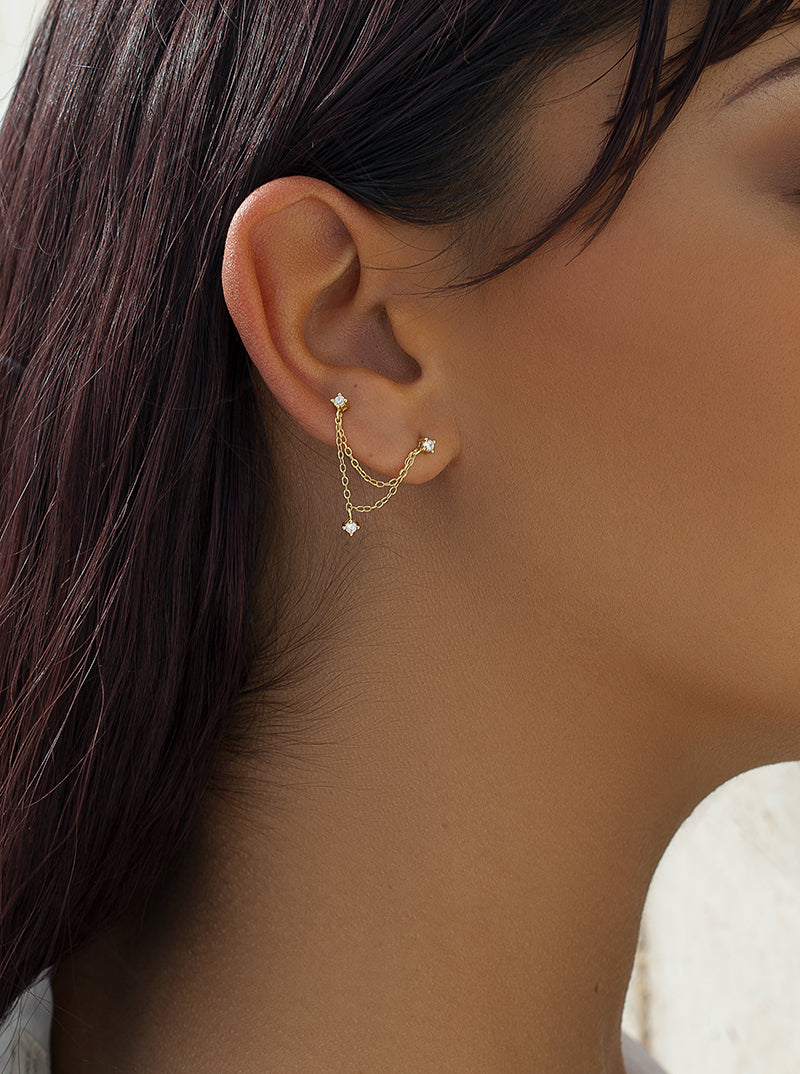 Percing de plata baño dorado diseño cadenas