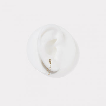 Piercing de plata bañada en oro diseño cadena