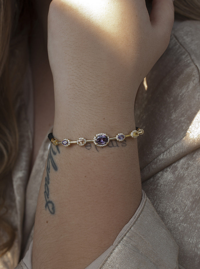Pulsera de plata con piedras de colores en tonos morados y cordón negro-LINEARGENT