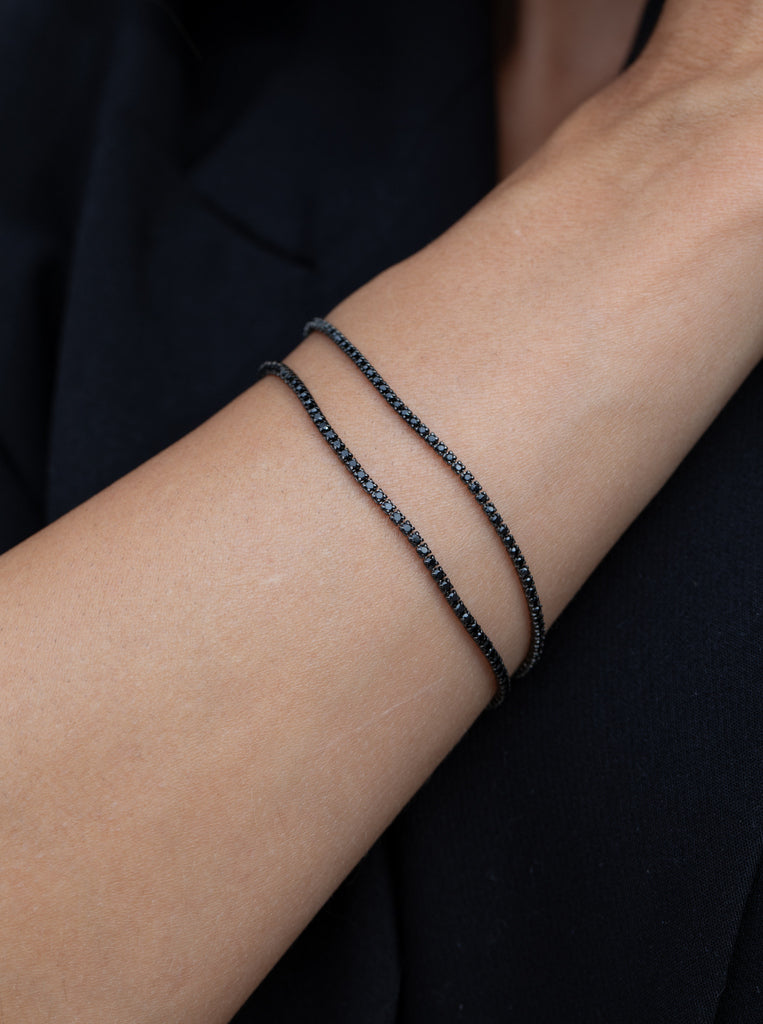 Pulsera riviere baño rutenio circonitas negras en talla princesa