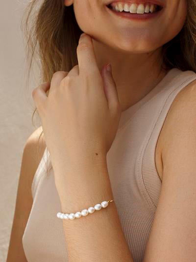 Pulseras con perlas en plata diseño dorado