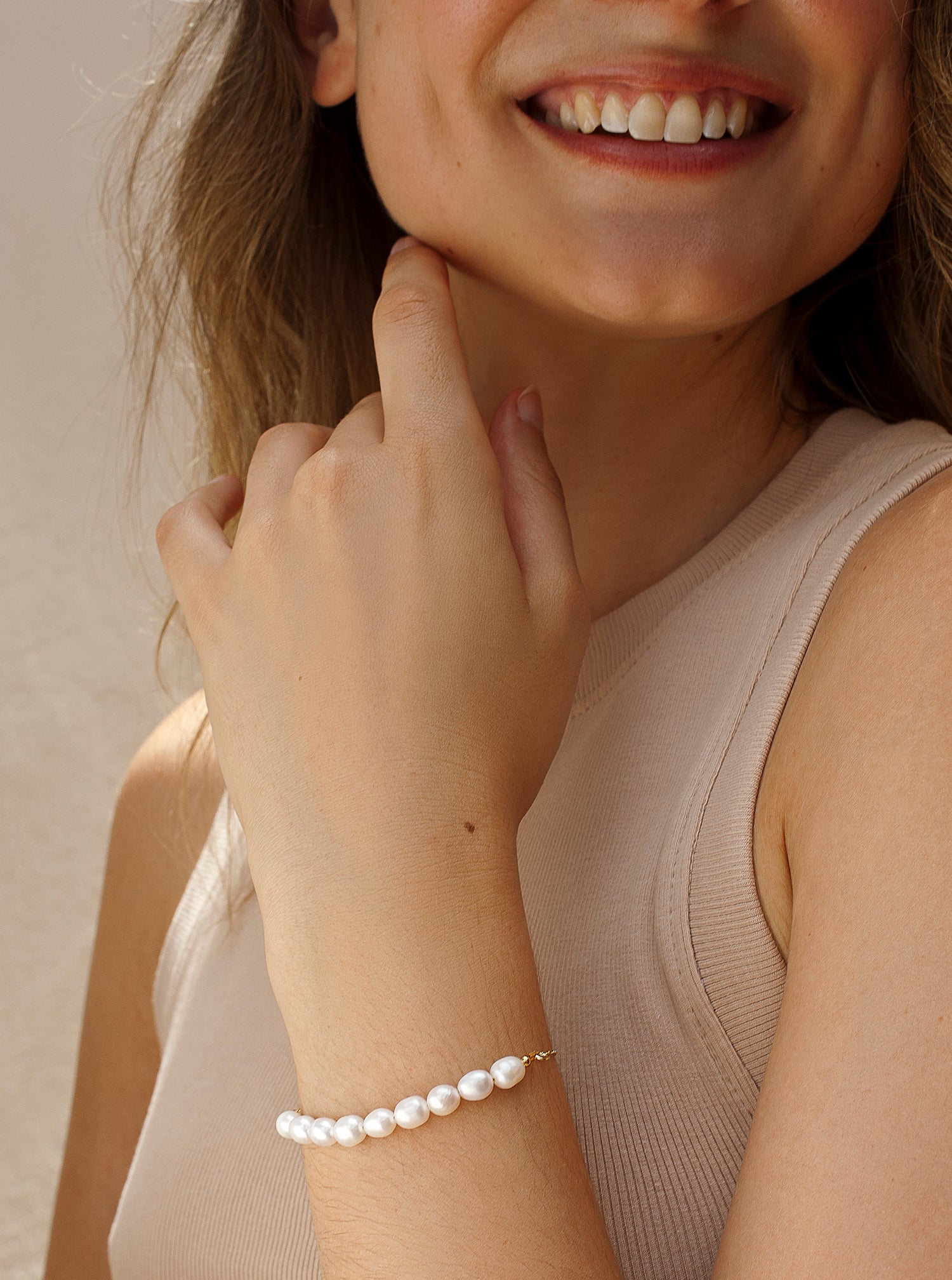 Pulseras con perlas en plata diseño dorado