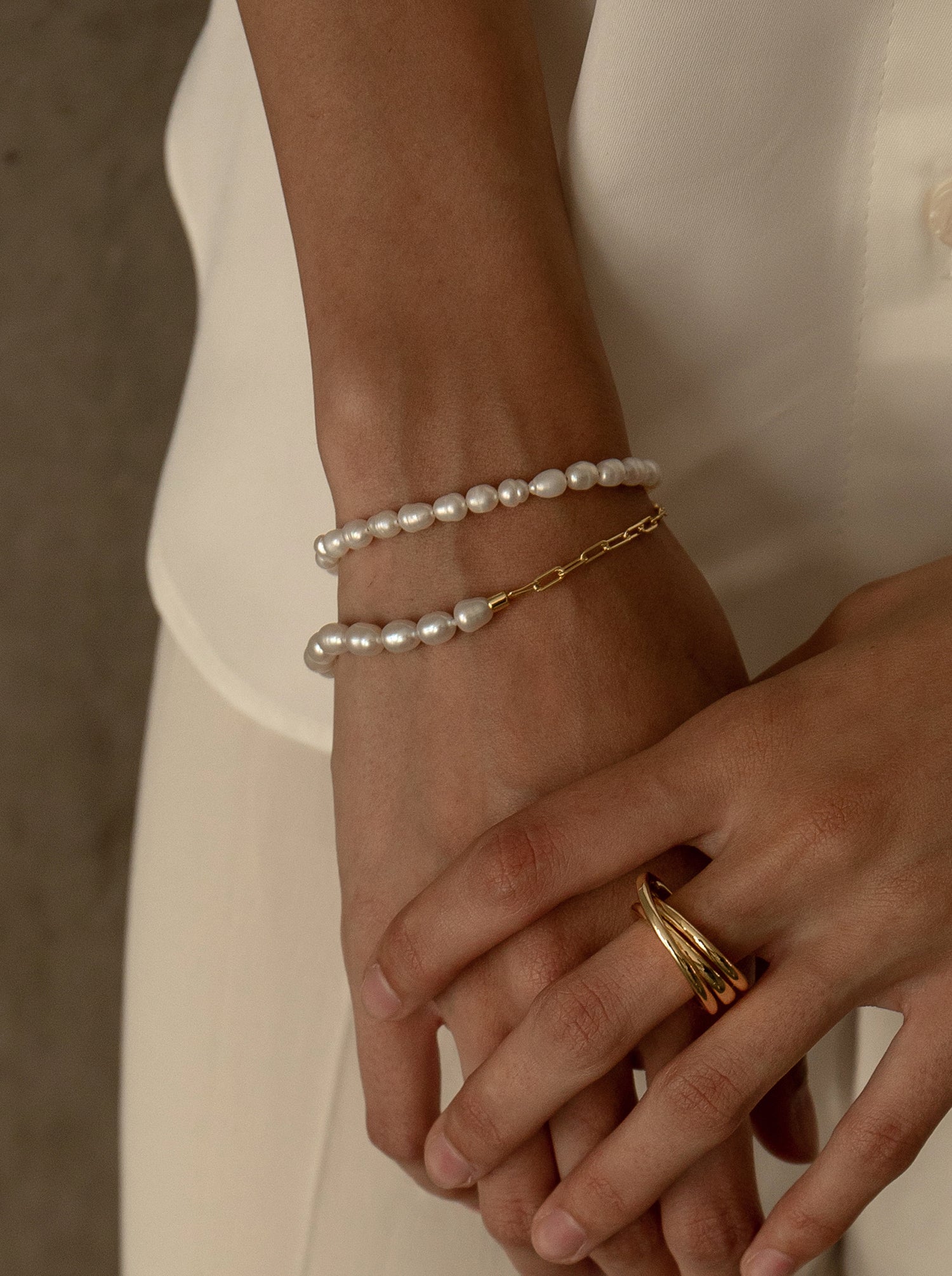 Pulseras con perlas en plata diseño paperclip