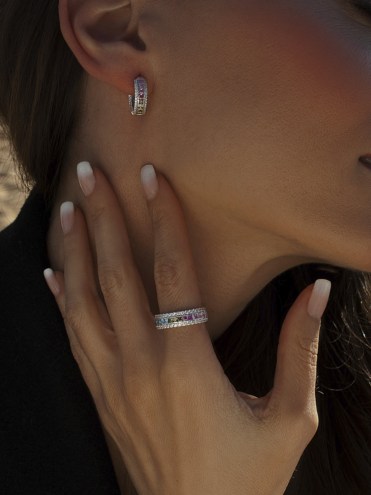 Hoop earrings with colorful stones in warm tones