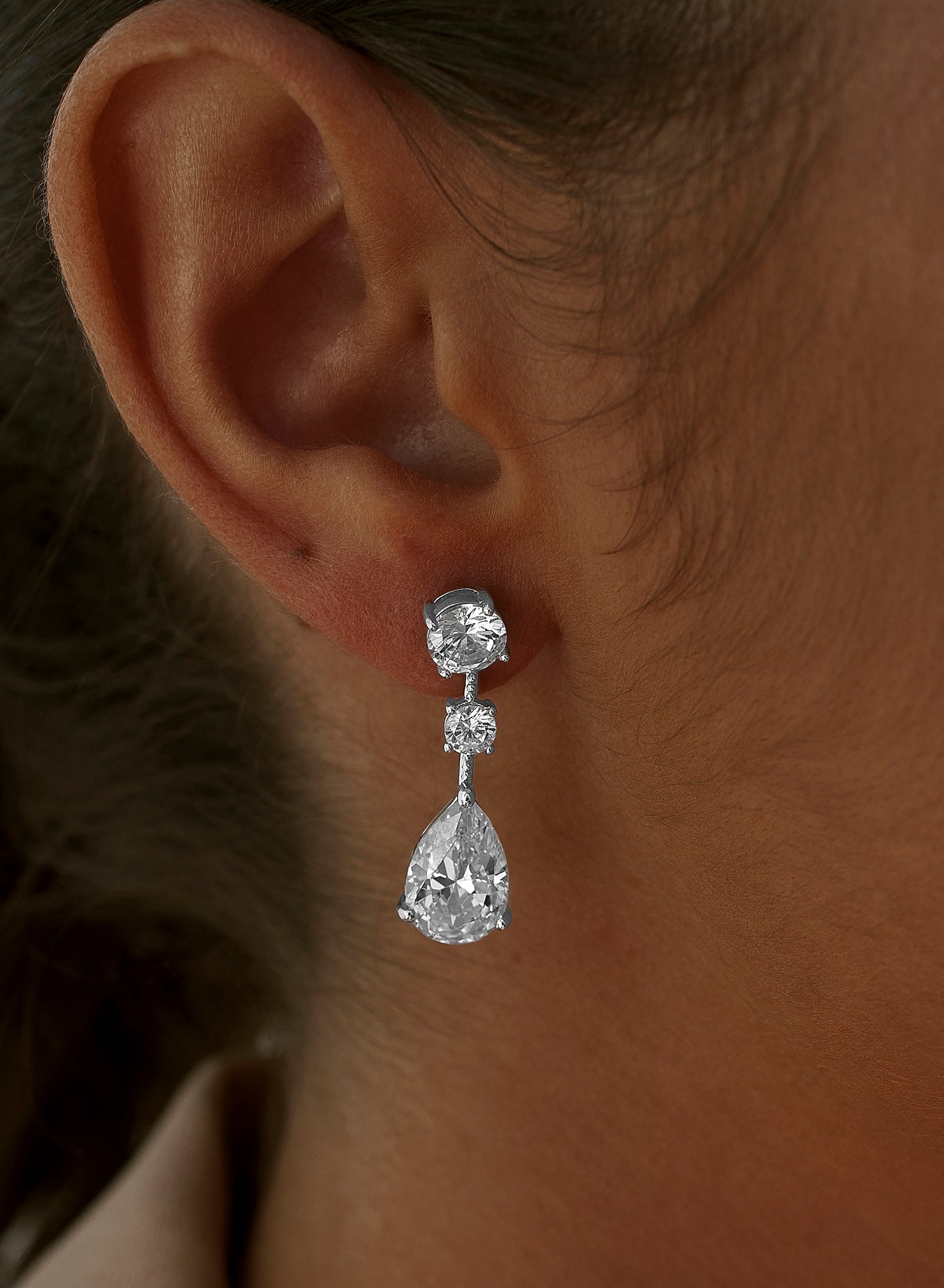 Small monochrome bridal earrings with zirconia stones