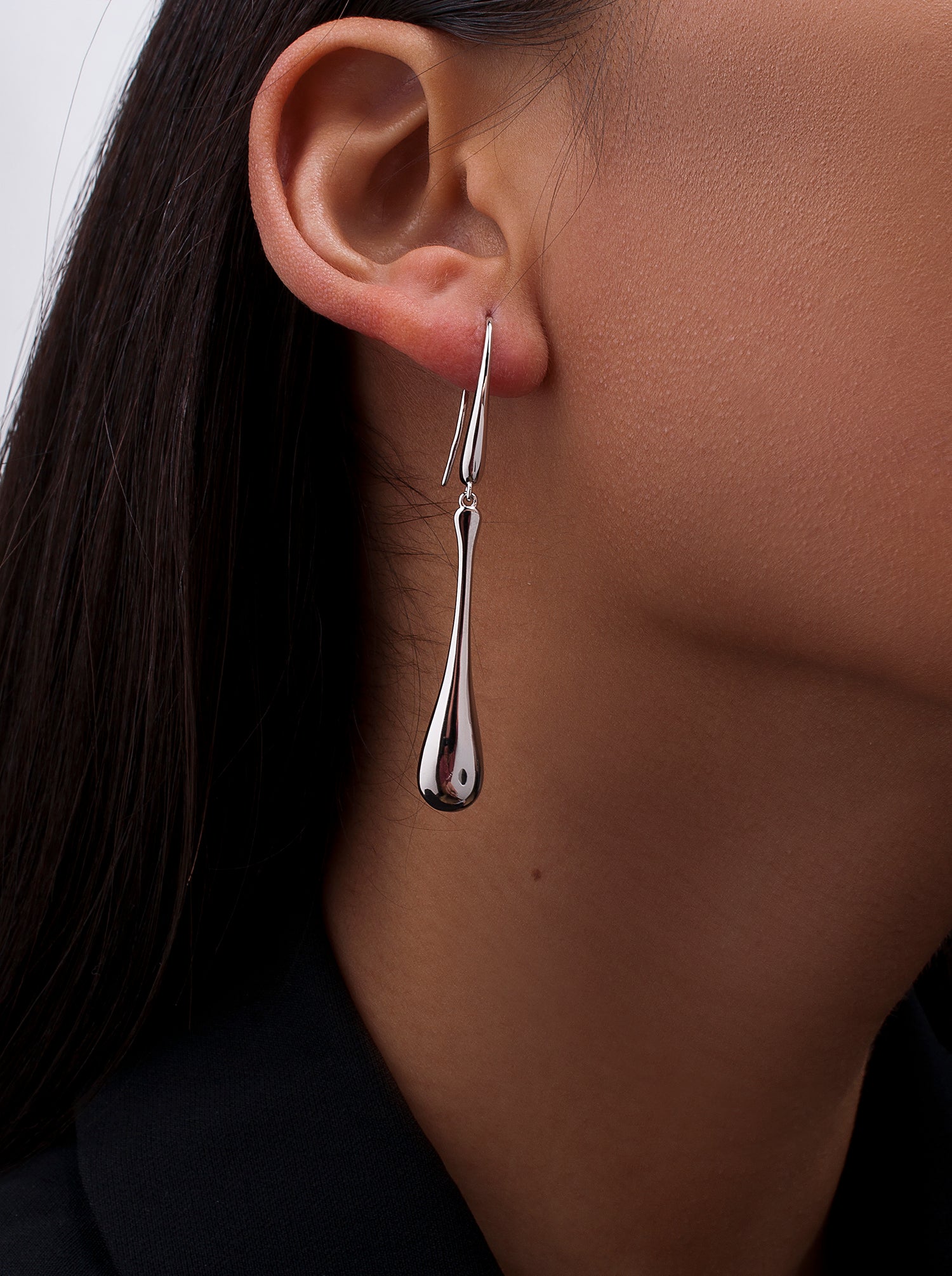 Original long silver earrings with teardrop design