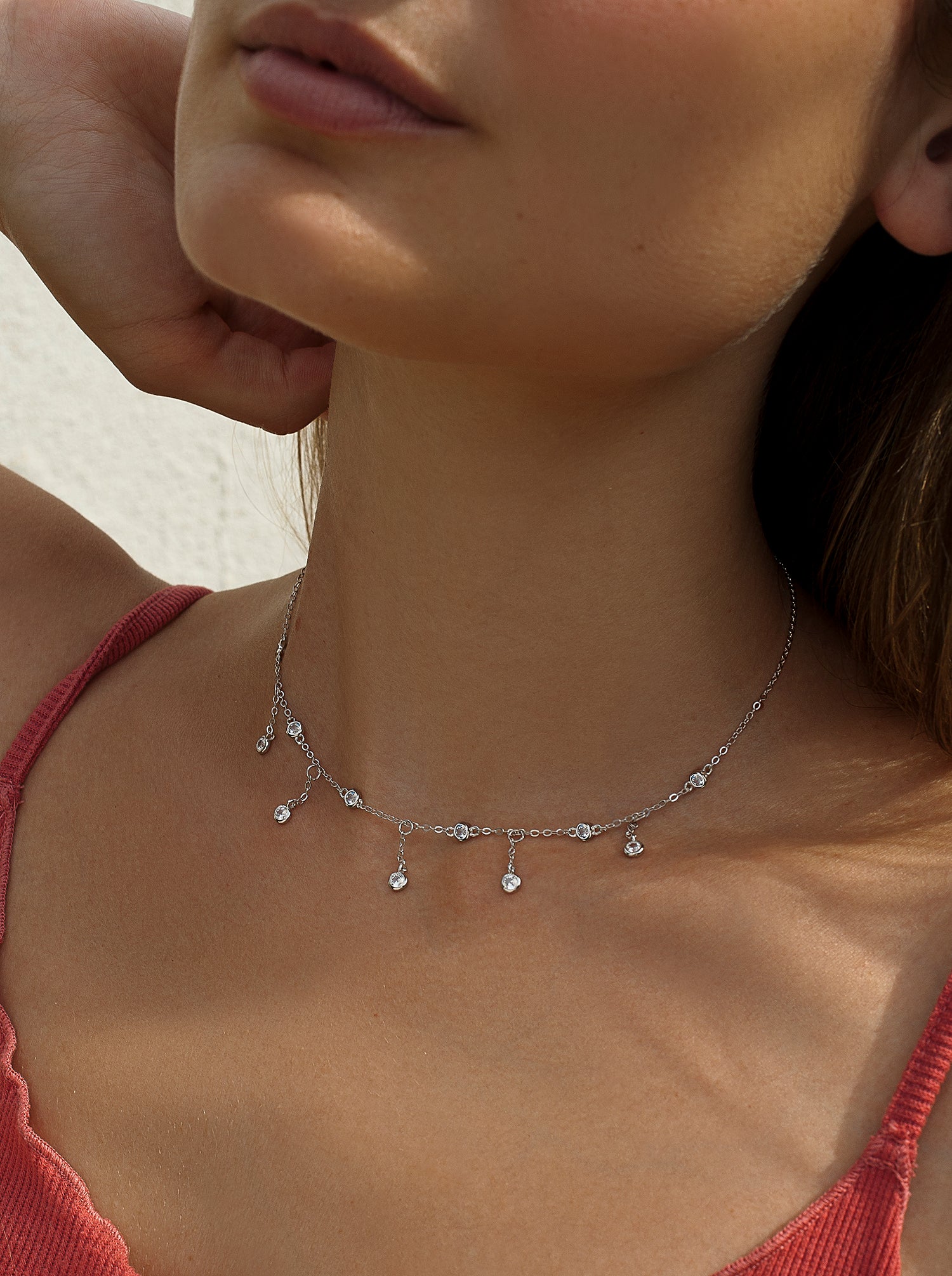 Necklaces with silver pendants with zirconia cascade design