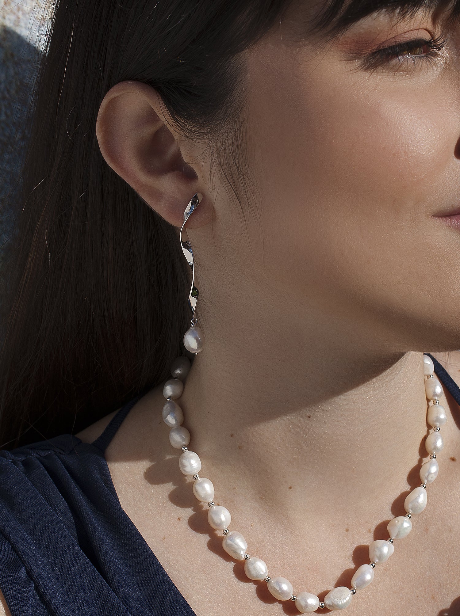 Pendientes perla de plata diseño curvilíneo