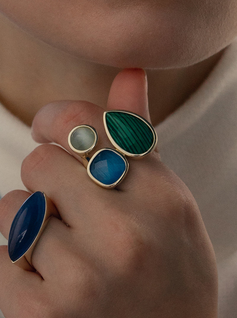 Rings with malachite teardrop design stones