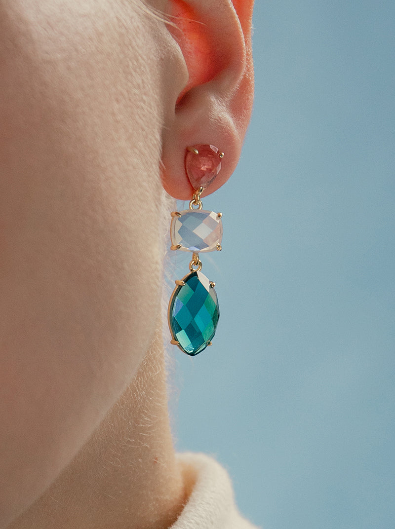 Earrings with long colored stones in turquoise tone