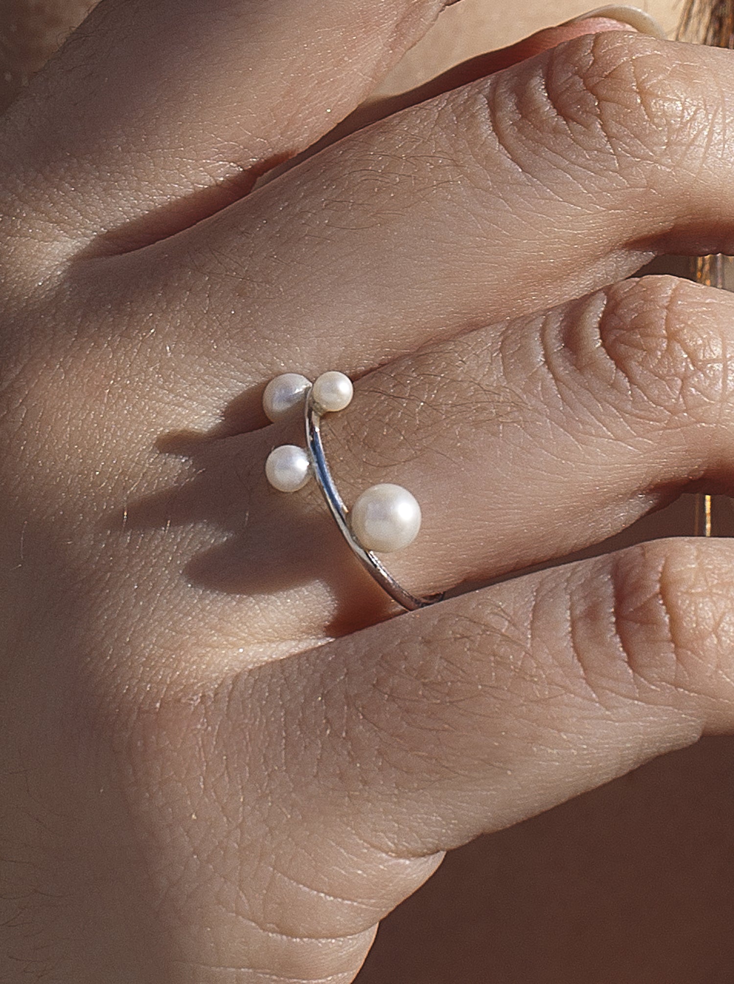 Anillos con perlas de plata diseño de cuatro perlas