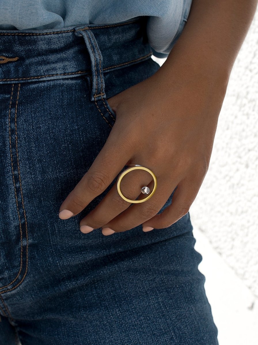 Anillos bicolor diseño circular y carriles en plata lisa