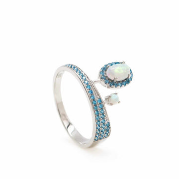 Anillos de diseño irregular con gemas y circonitas azules