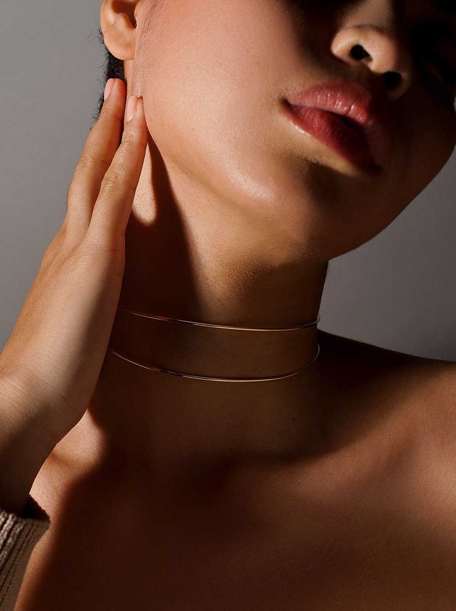Rigid choker double gold in  silver rail