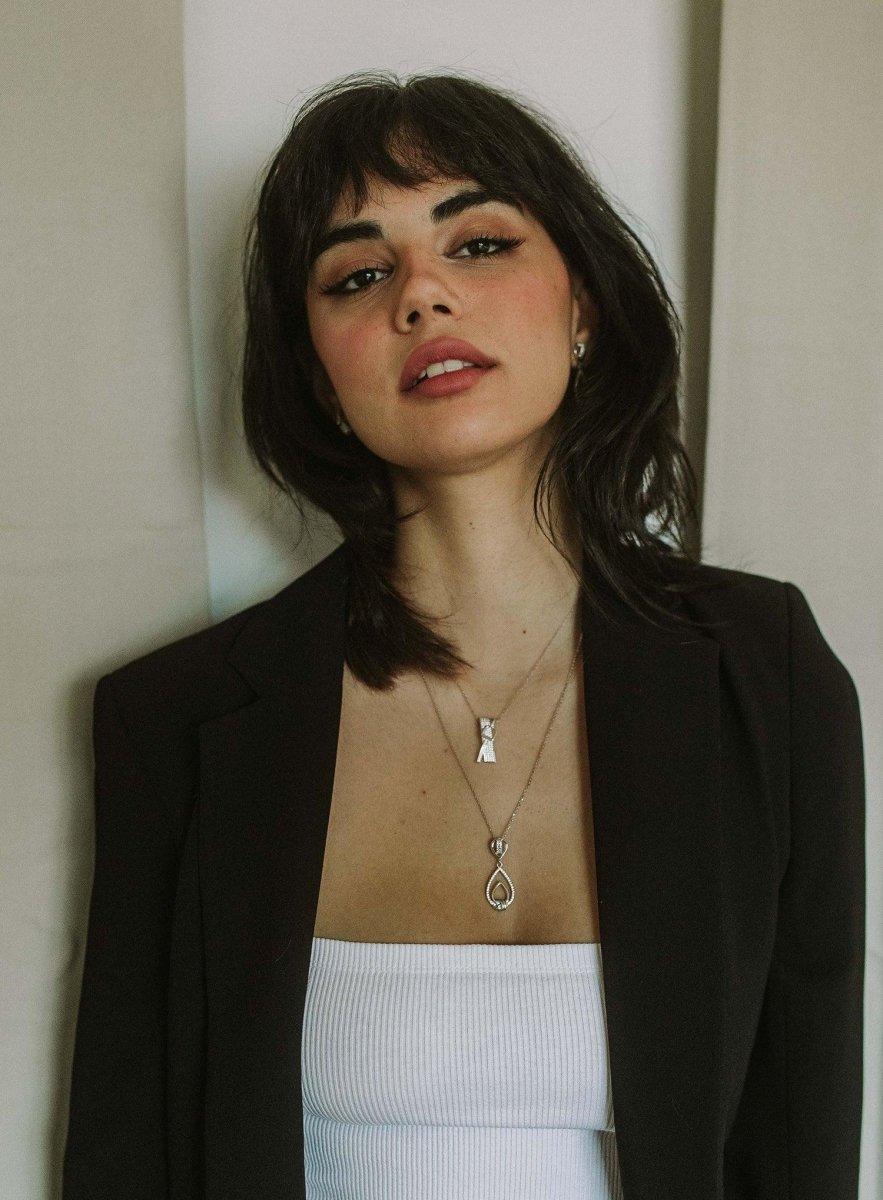 pendentif argent brillante design boucles avec sertissage zircons croiséLINEARGENT