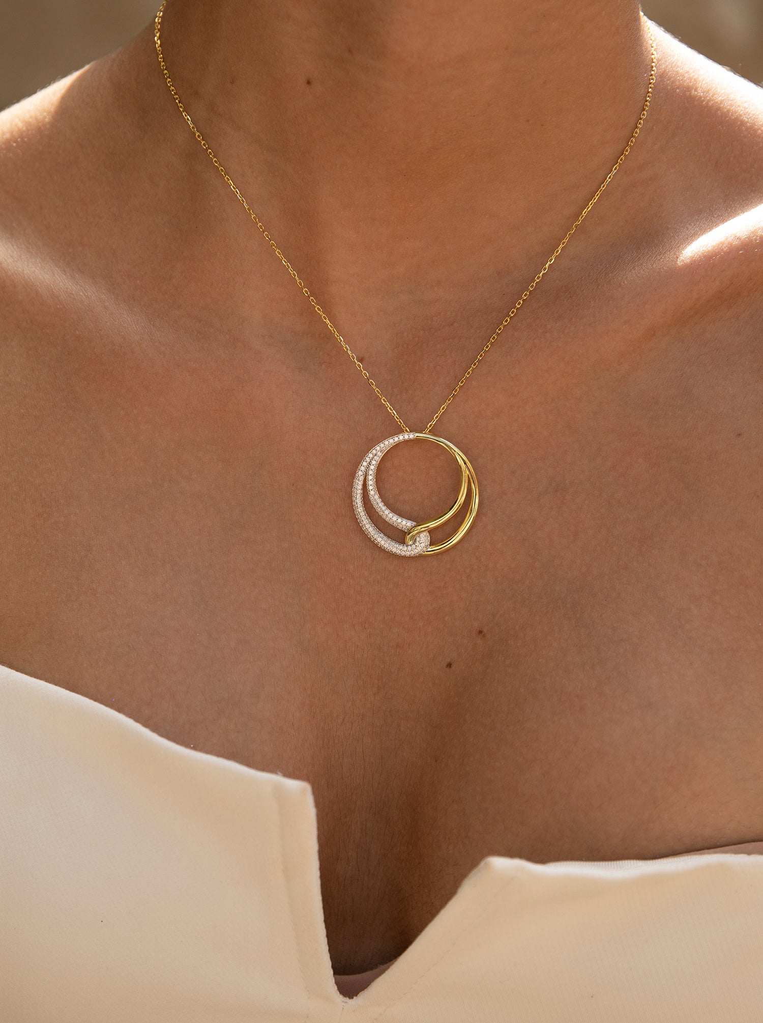 Colgantes bicolor de plata combinado con circonitas