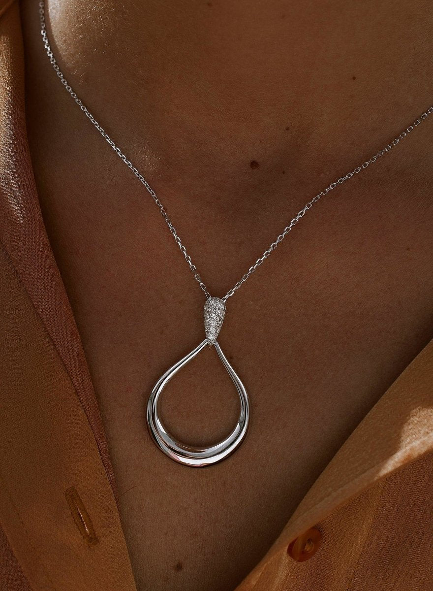 Colgantes de plata grandes en forma de lágrima y detalle de circonita-LINEARGENT