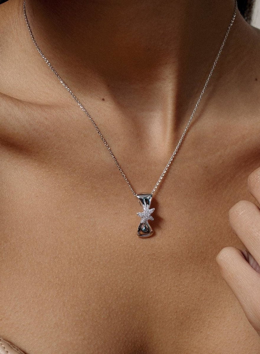 petits pendentifs de argent avec de motif  enétoile au centre et étoile zircons-LINEARGENT