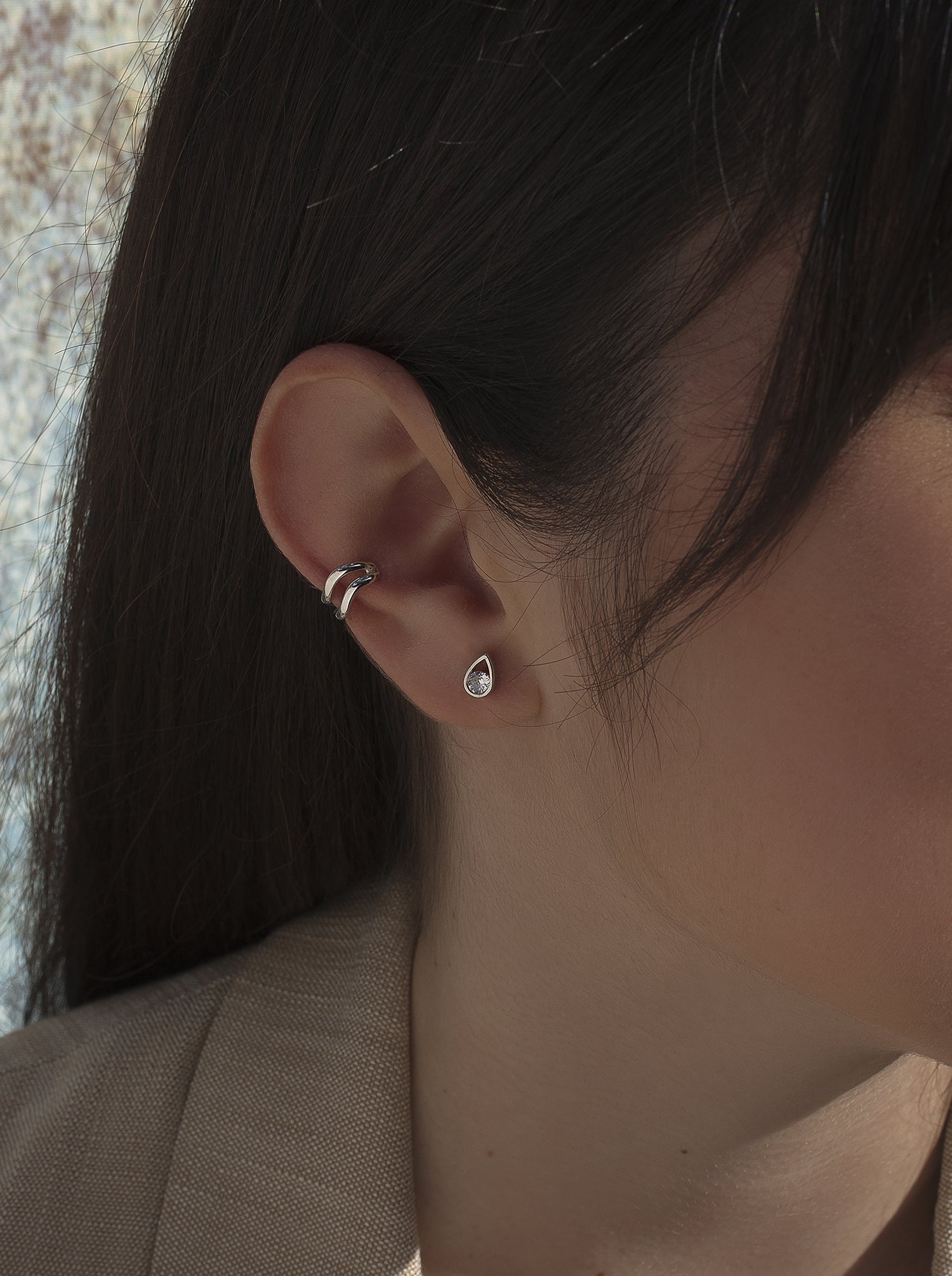 Silver Ear cuff formed by two hoops