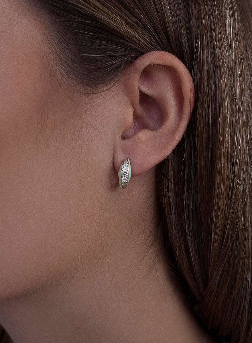 Boucles d'oreilles créoles petits design de divisé et zircons