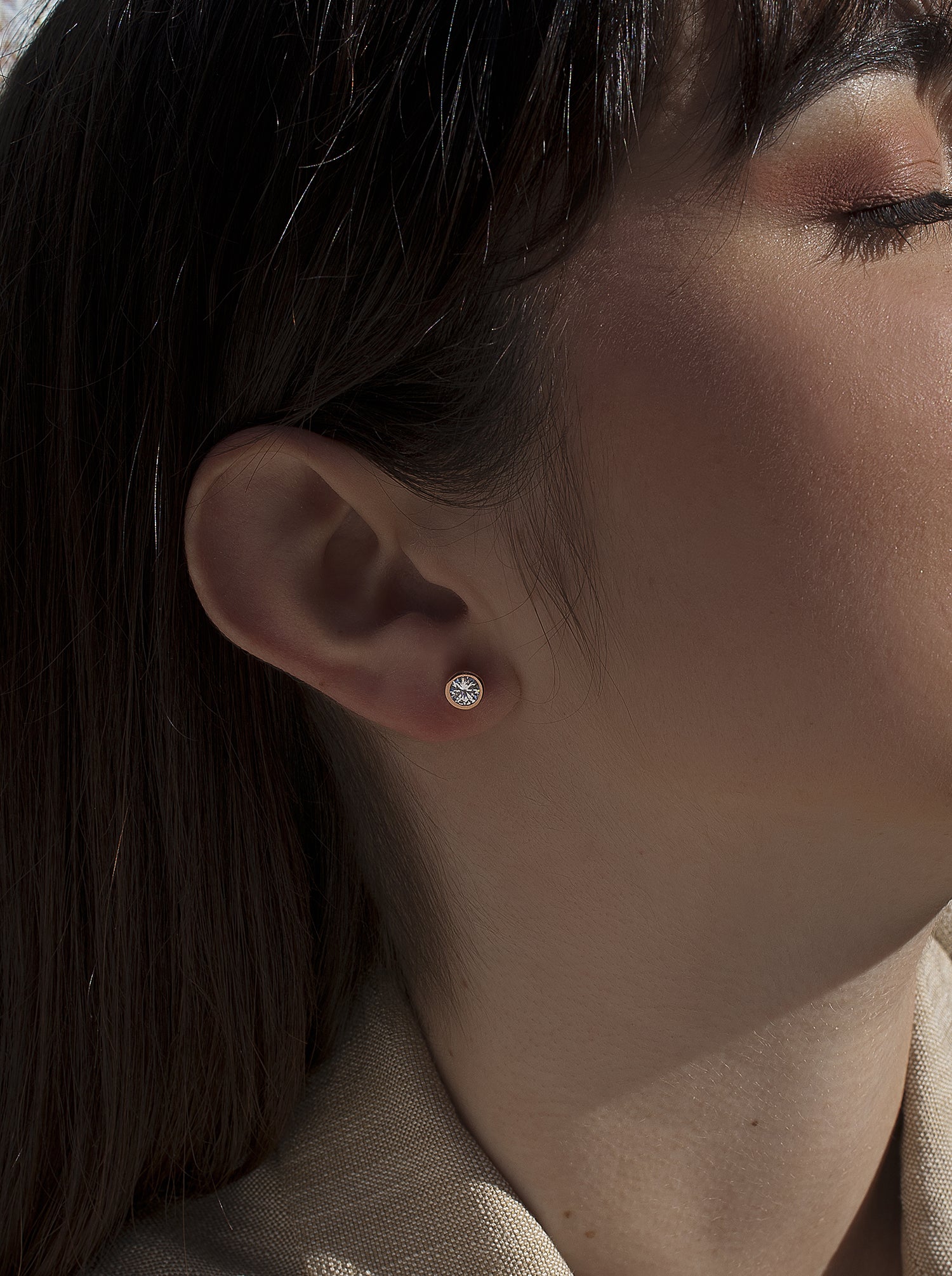 Pendientes botón diseño circular con circonita y oro rosa