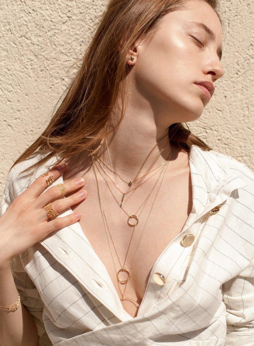 Boucles d'oreilles boutons design plaqués croisées de LINEARGENT