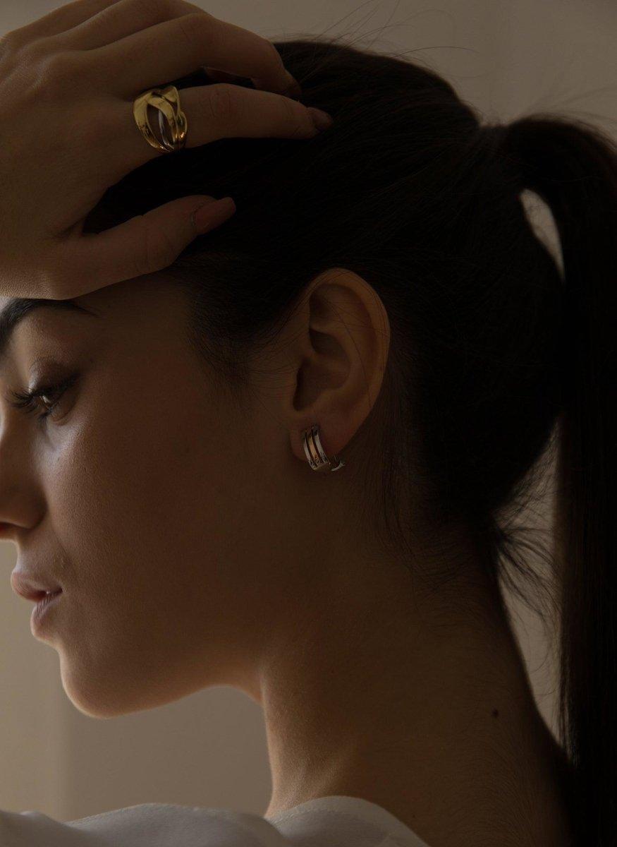 Boucles d'oreilles fermeture omega design linear de argent LINEARGENT