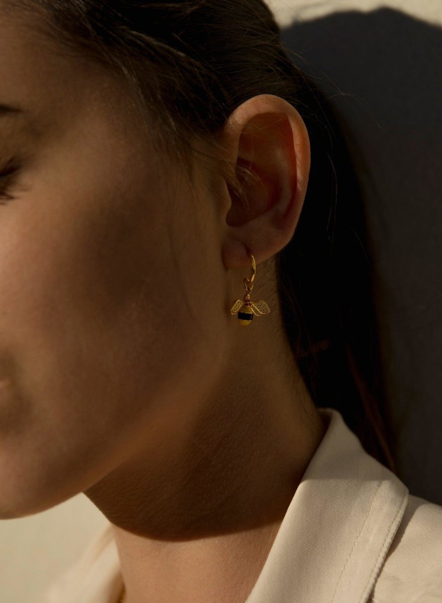 Boucles d'oreilles avec pendentifs motif de  et mouches