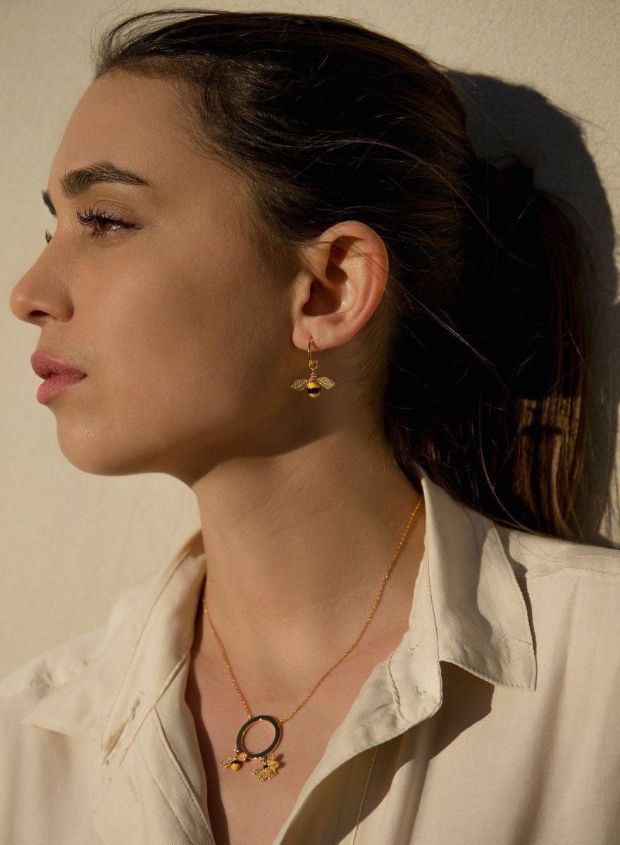 Boucles d'oreilles avec pendentifs motif de  et mouches