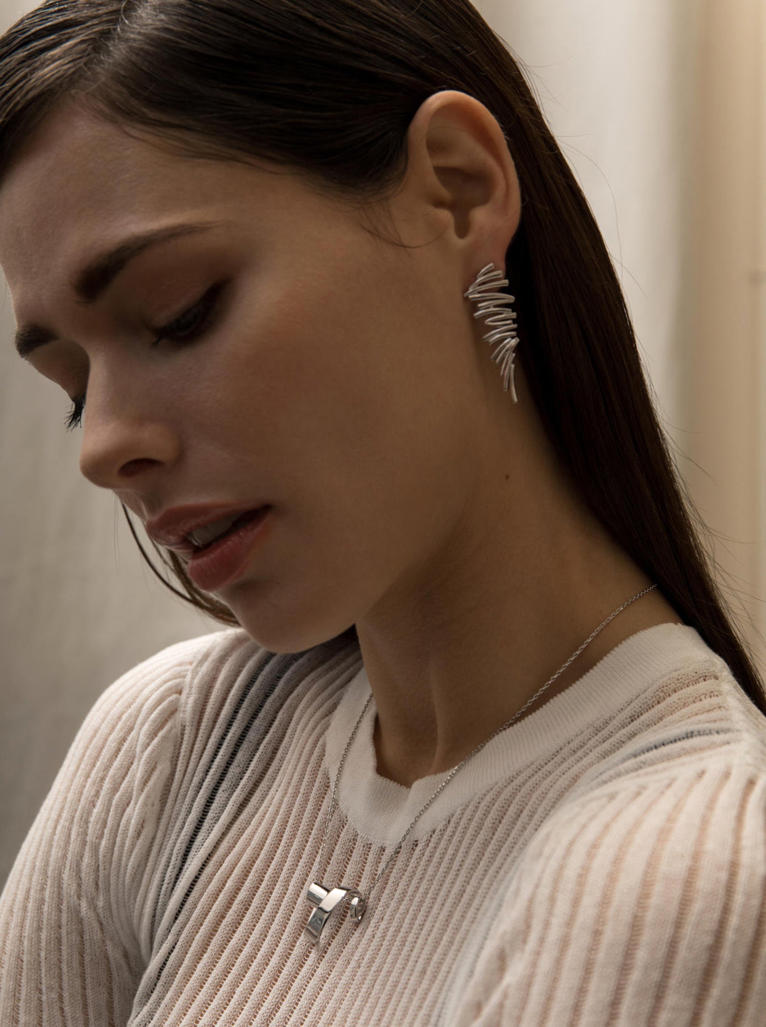 Pendientes originales de plata diseño alado irregular