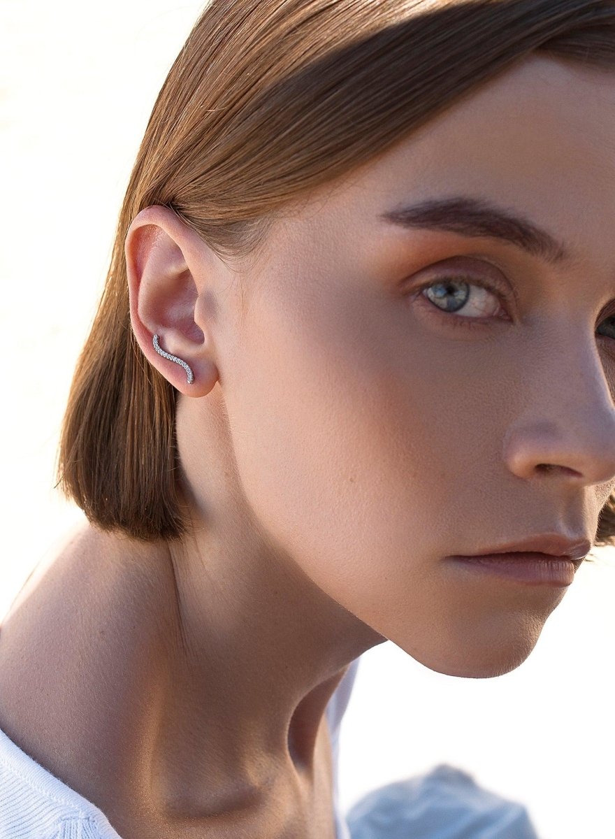 Boucles d'oreilles grimpeurs en argent design incurvé