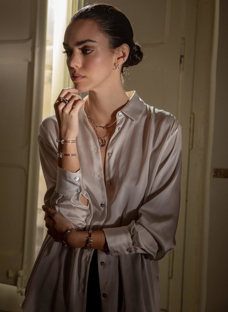 Pulsera esclava de plata diseño tirabuzones de circonita y plata lisa