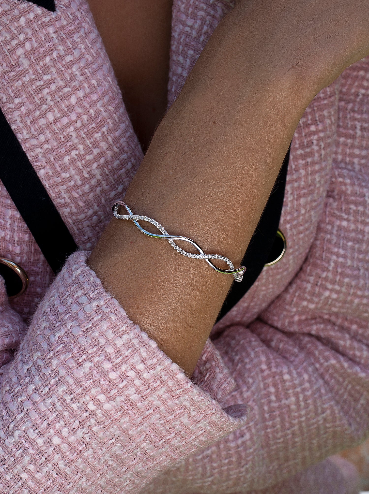 Pulsera esclava de plata doble carril entrelazado con circonitas