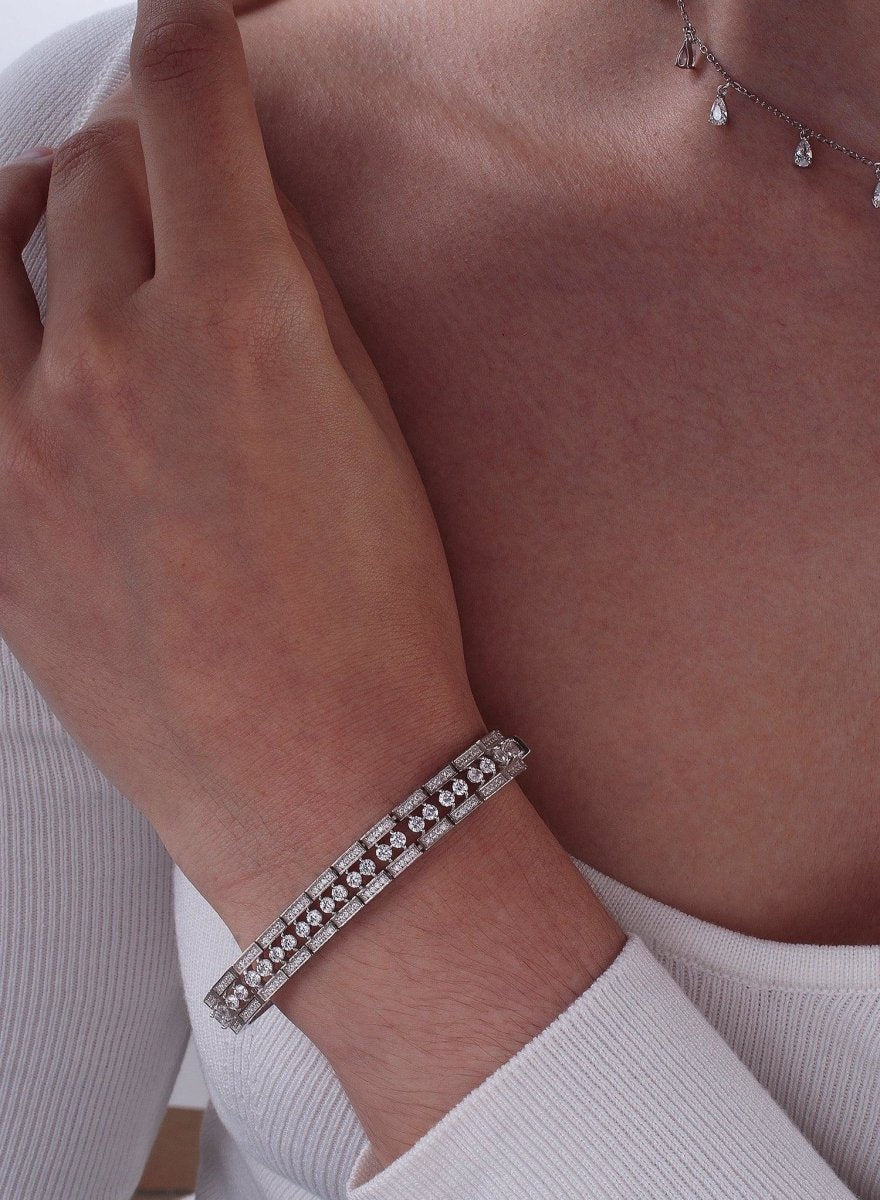 Pulseras brillantes de plata con raíl central de circonitas