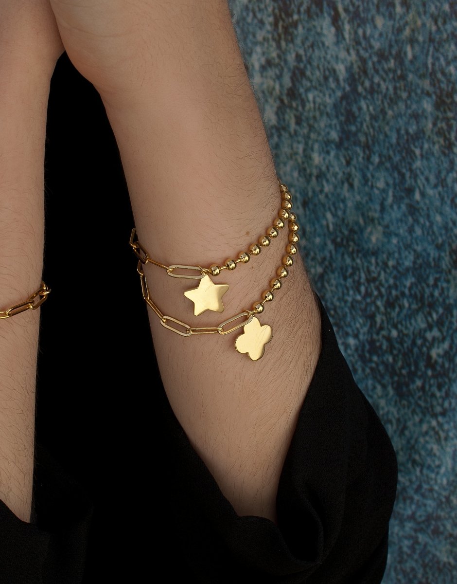 Pulseras con colgantes de plata bañados en oro con colgante en forma de estrella
