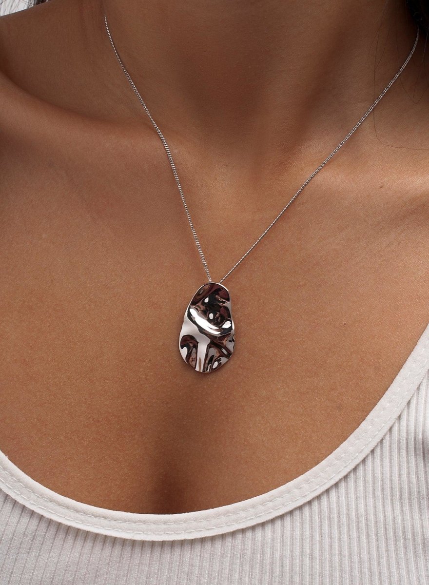 Necklace - Original silver pendants with circular elongated motif