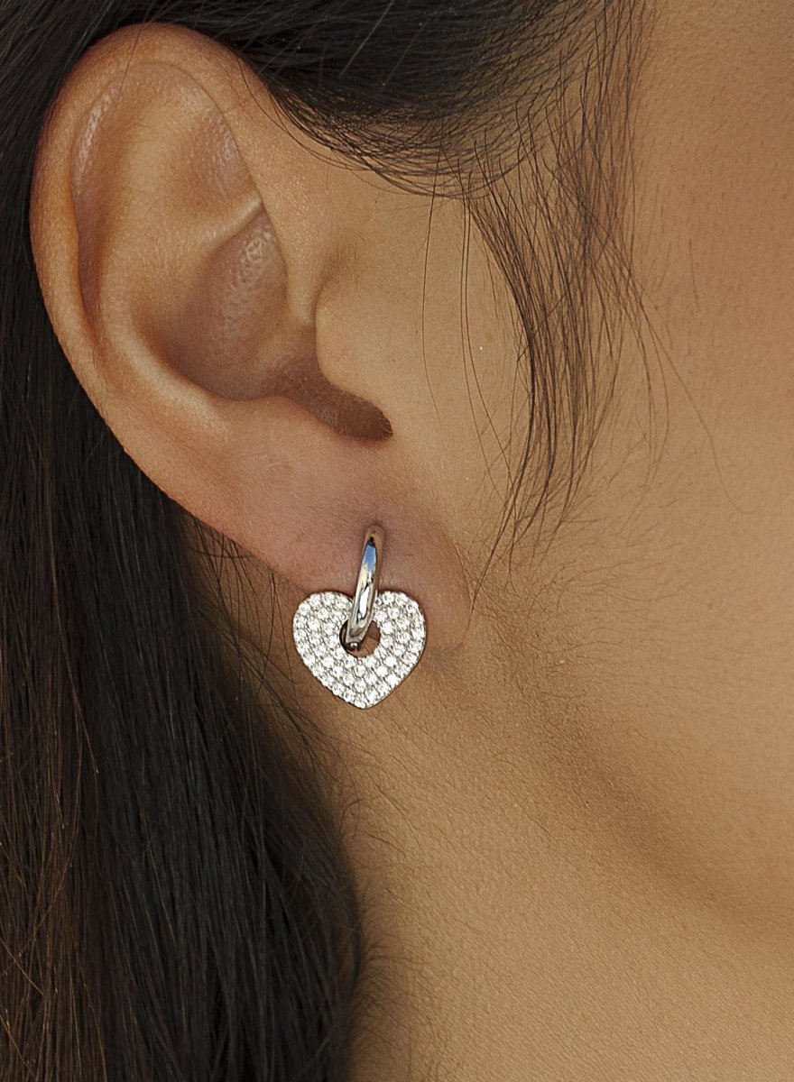 Earrings - Hoop earrings with heart motif pendants in plain silver