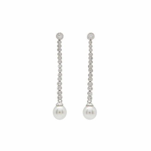 Pendiente · Pendientes largos perlas diseño elegante con circonitas