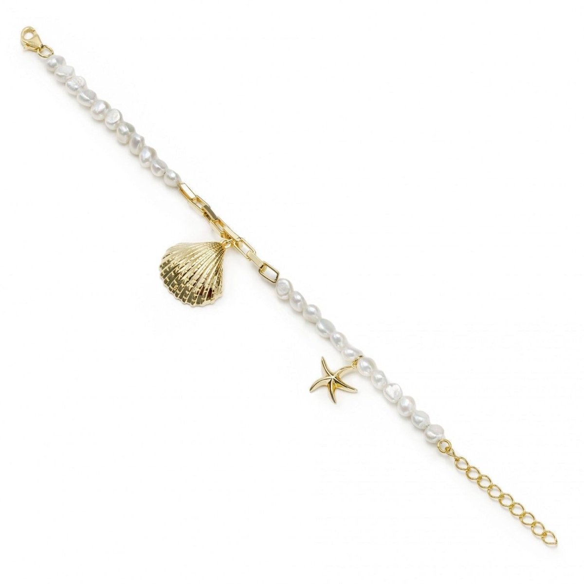 Pulsera · Pulseras de perlas en oro diseño charms de concha y estrella de mar